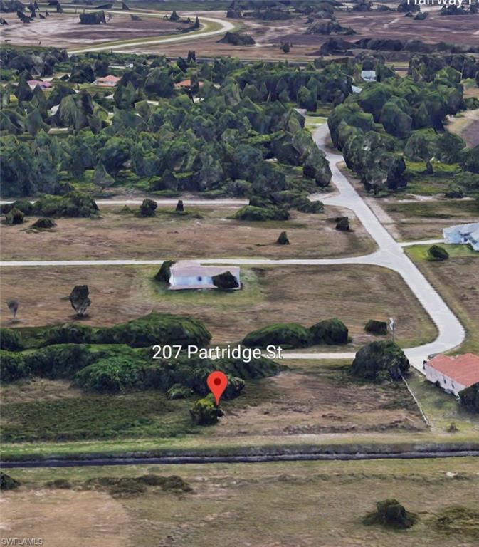 Aerial view of property's location with rural landscape