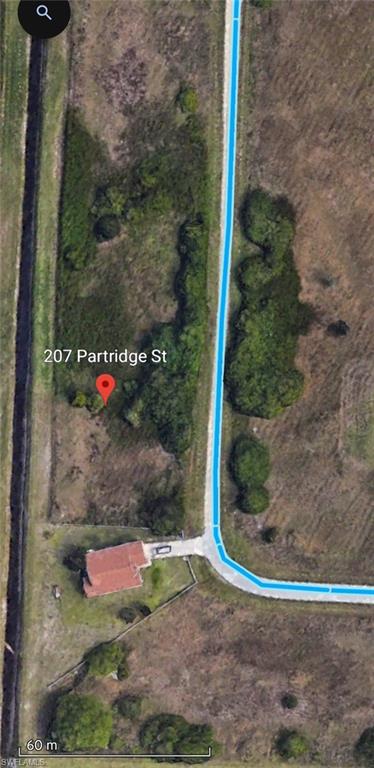 Aerial view of property's location with property parcel outlined