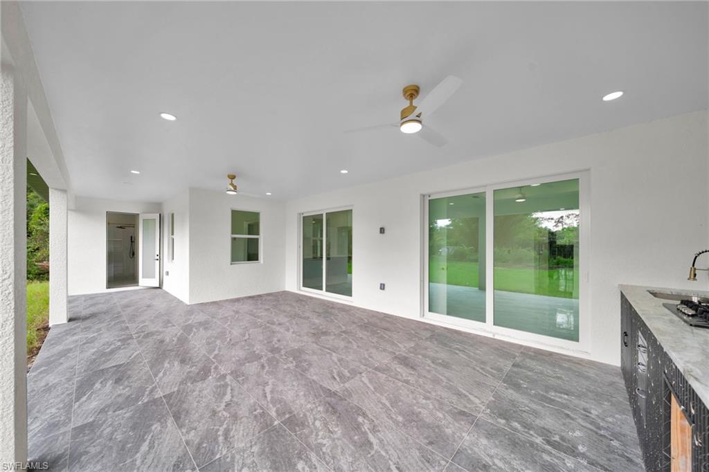 Unfurnished sunroom with a sink