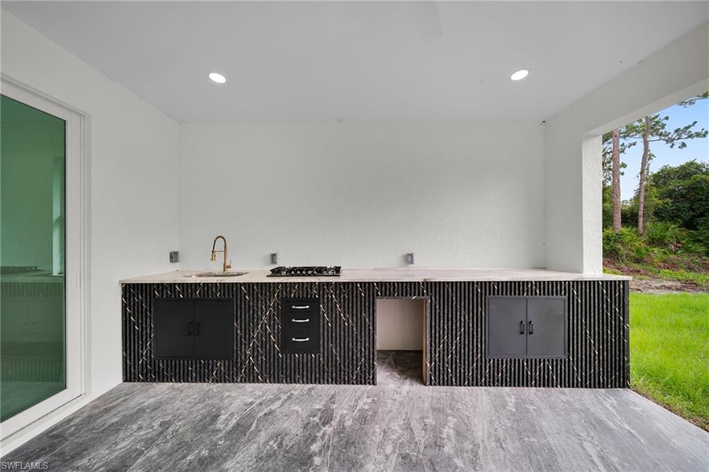 View of patio / terrace with a sink