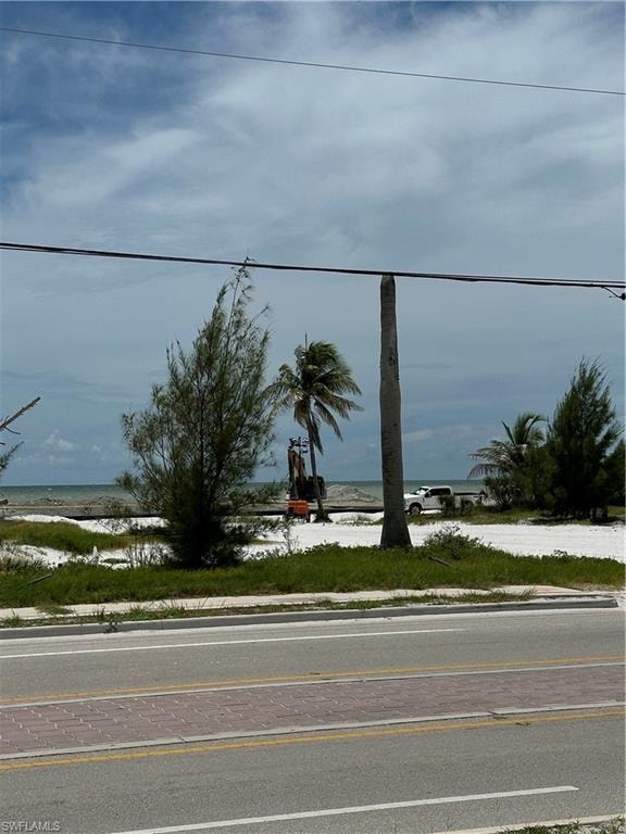 View of asphalt street featuring a water view