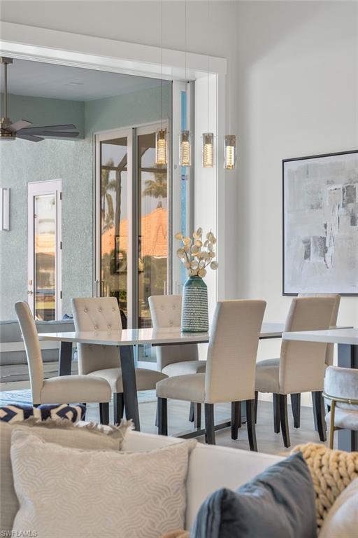 Dining area with ceiling fan