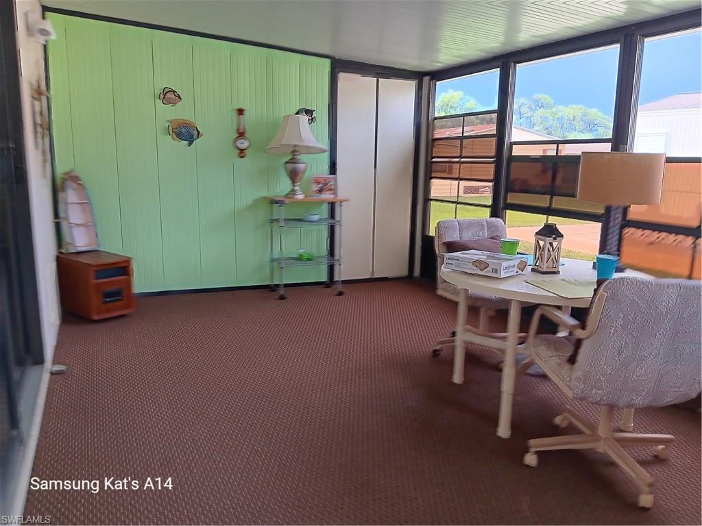 with adjustable windows and sun protecting sliders and door to laundry room
