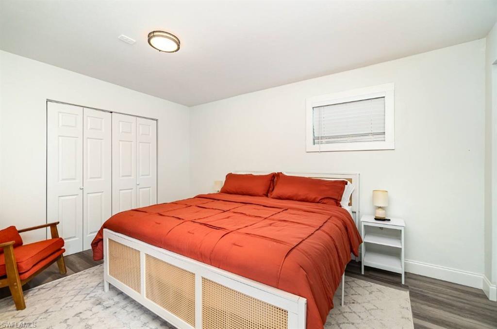 Bedroom featuring a closet and wood finished floors
