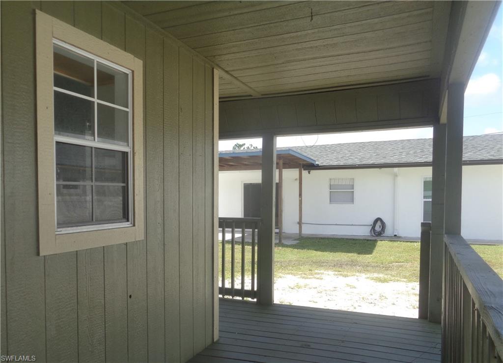 View of wooden terrace of the permitted 2 bed / 1 bath apartment