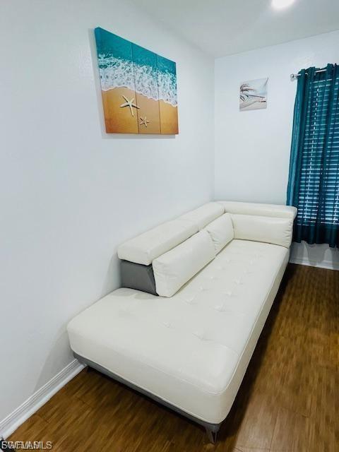Living area with wood finished floors
