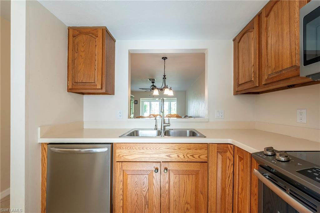 Kitchen w/ Pass through to Dining Room