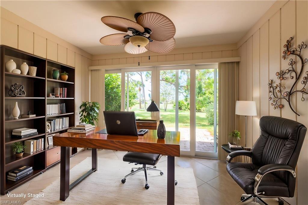 Virtually Staged as Office in Enclosed Lanai