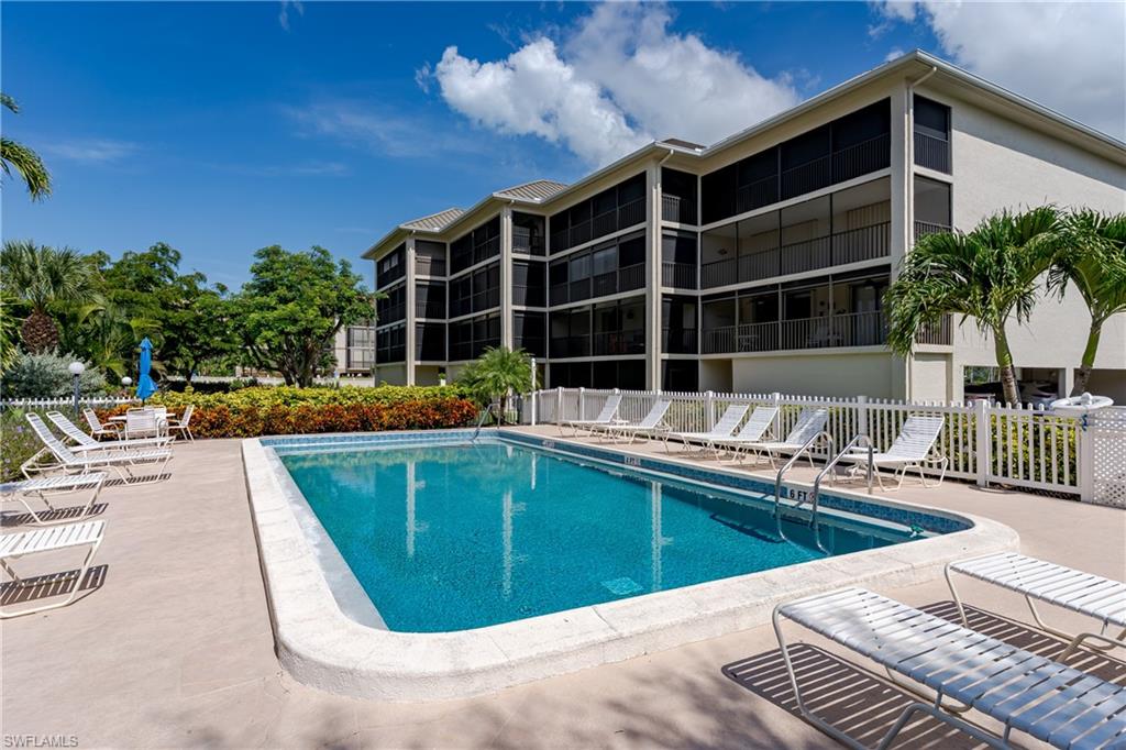 Community pool featuring a patio area