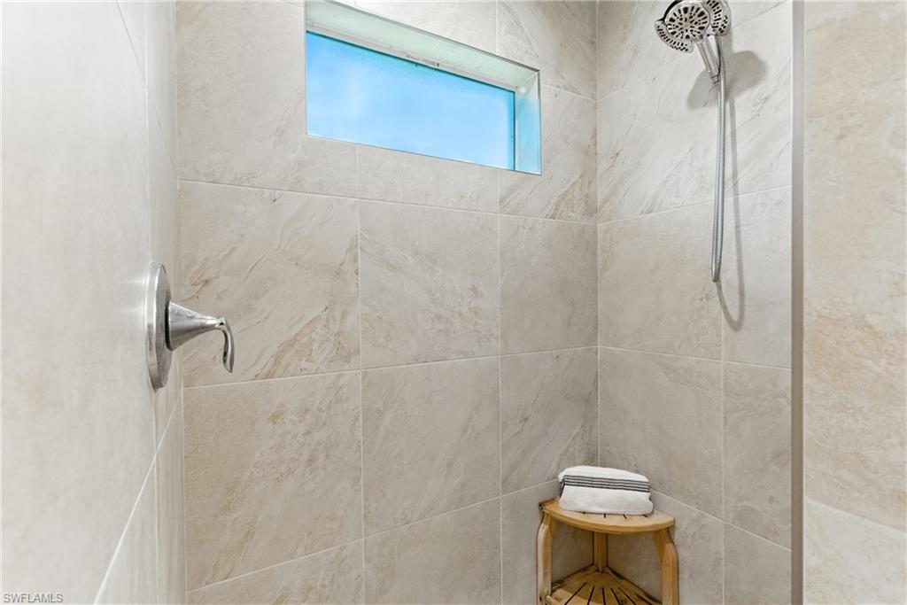 Bathroom with a tile shower