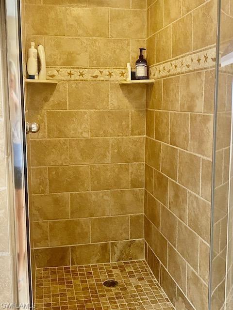 Bathroom with tiled shower