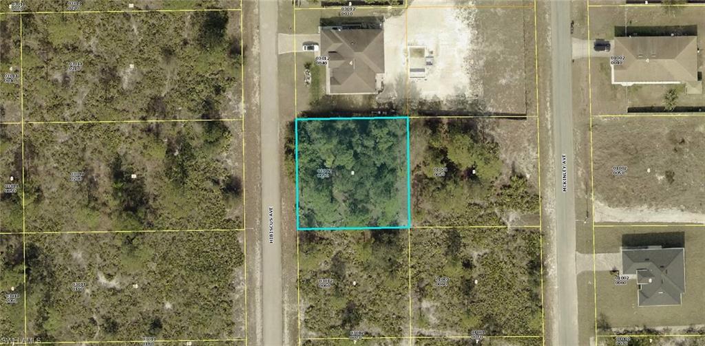 Aerial view of property's location featuring property parcel outlined