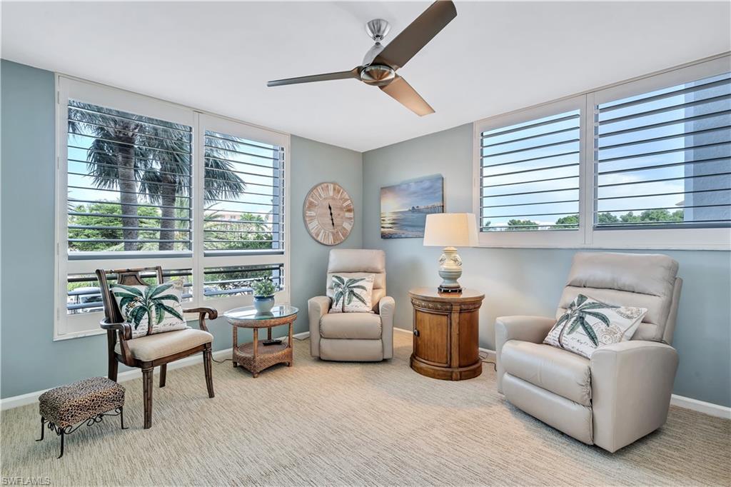 Den with Murphy Bed  and ceiling fan