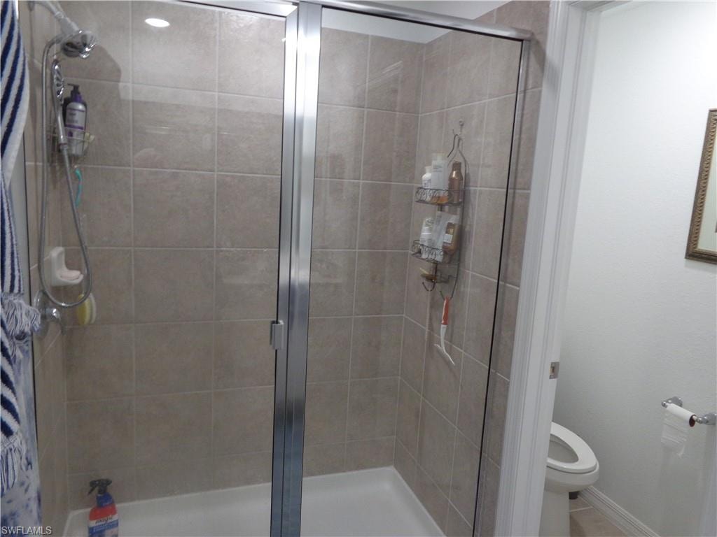 Bathroom featuring a shower stall