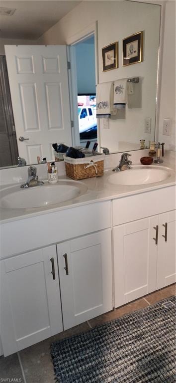 Bathroom featuring double vanity