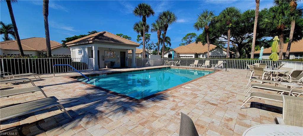 Community pool featuring a patio area