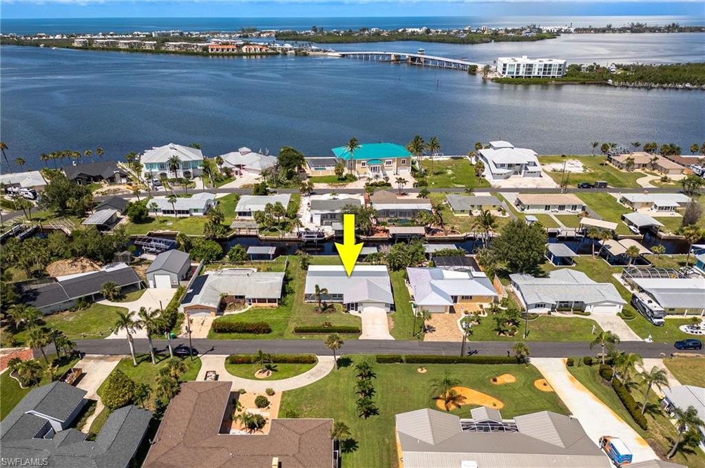 Aerial view of the property just three lots from Lemon Bay, showcasing direct bridge-free access to the Intracoastal and Gulf of America