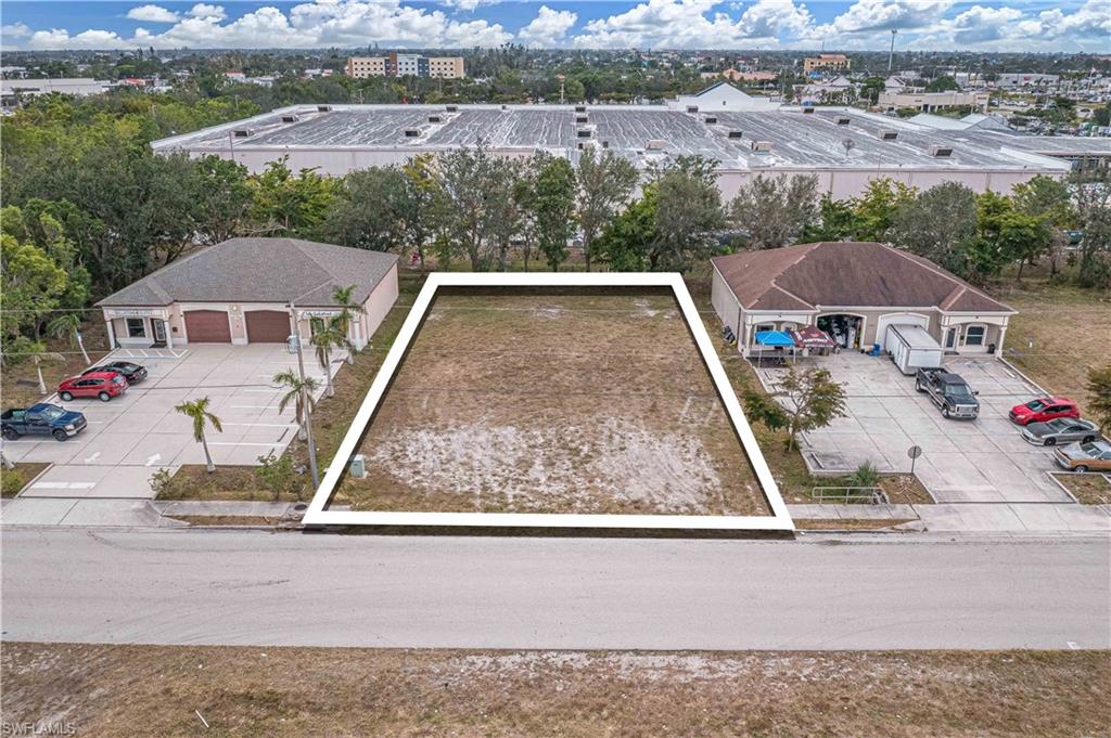 Aerial view of property's location featuring property parcel outlined