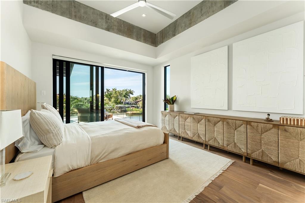 Large Guest Bedroom bay views and high celings showcasing the buidlings solid concrete structure