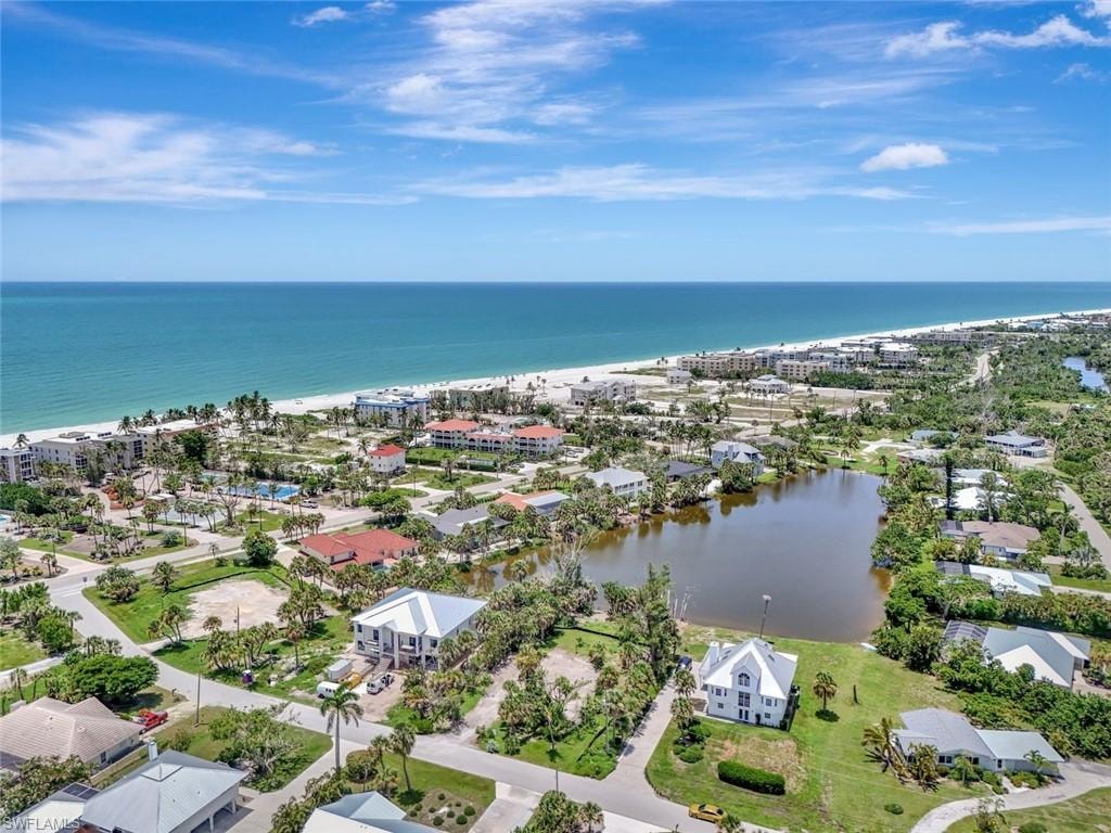 Aerial view of residential area with a nearby body of water
