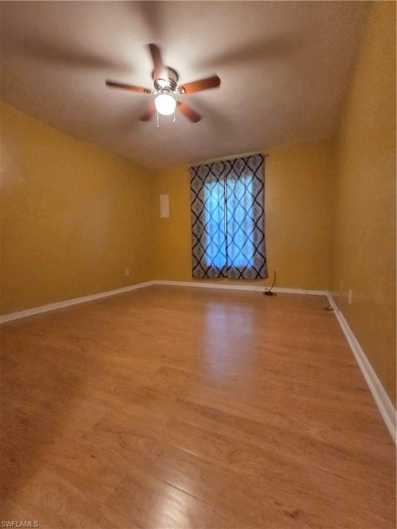 Master bedroom featuring wood finished floors and ceiling fan