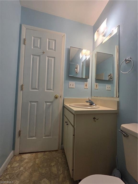 Full guest bath featuring vanity and vinyl stone finish flooring