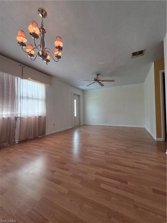 Unfurnished sunroom with a ceiling fan