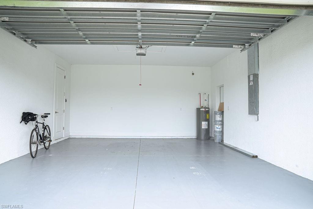 Garage with electric panel and water heater