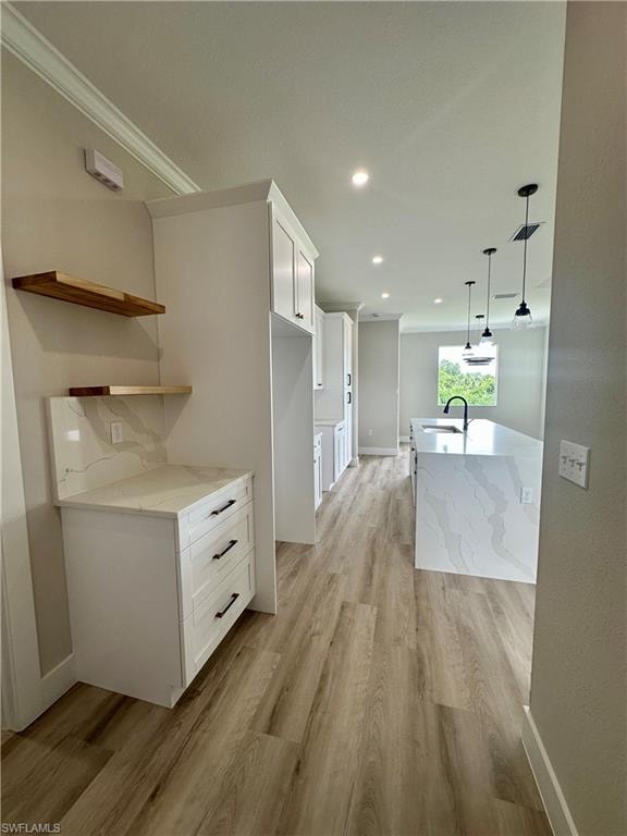 Bedroom with wood finished floors, a ceiling fan, recessed lighting, and a raised ceiling. Pictures virtually staged for illustrative purposes only