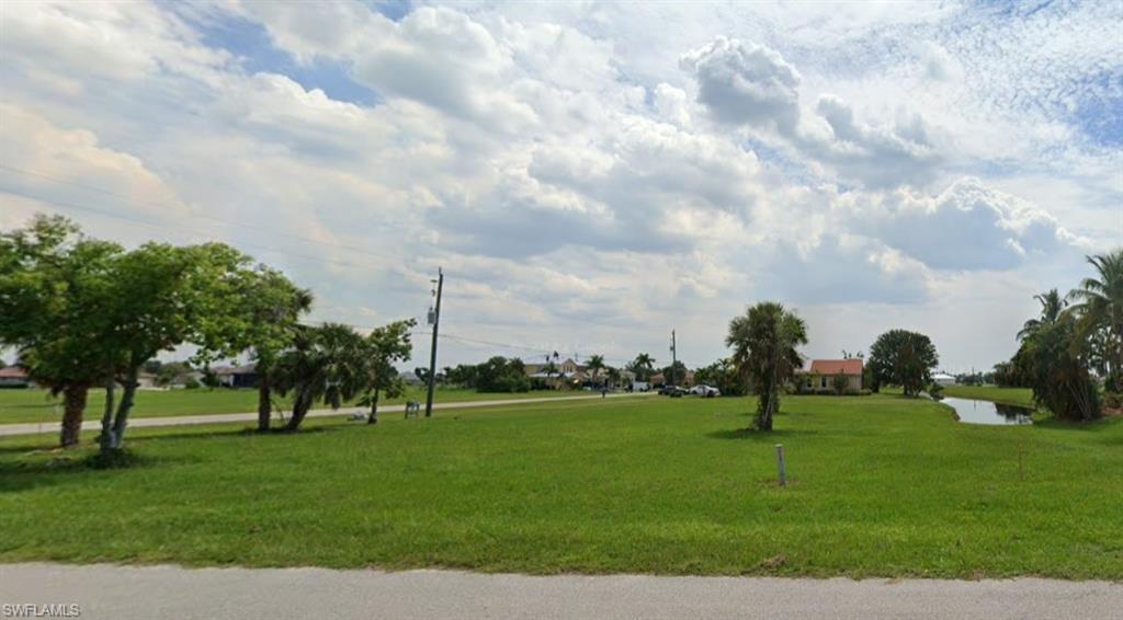 Side view of land with water feature