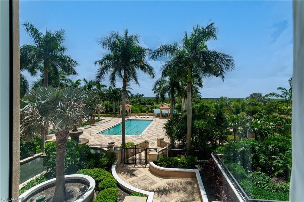 Community pool featuring a patio area