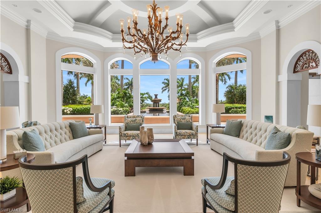Sunroom with a chandelier and healthy amount of natural light