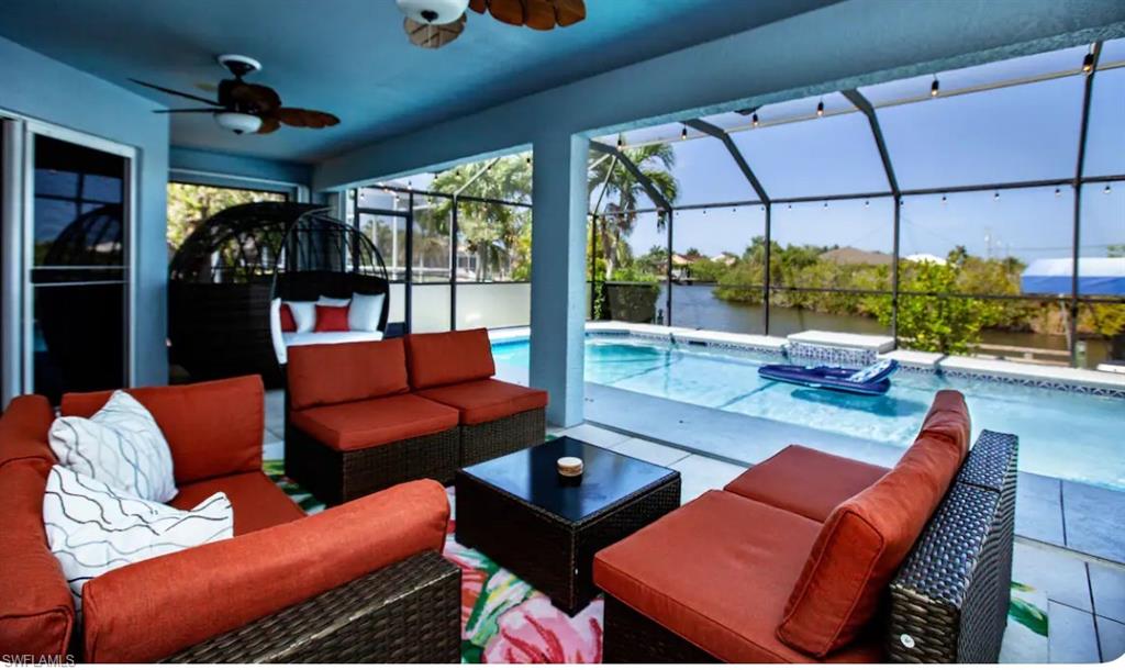 Outdoor living with screened lanai, custom pool and spa