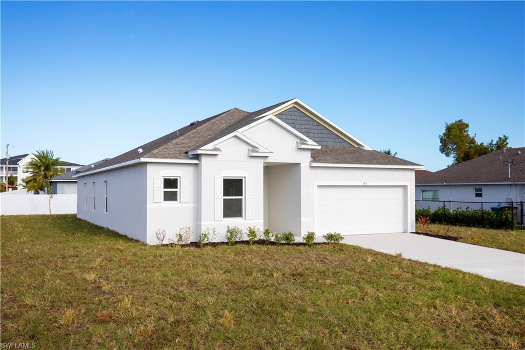 View of front of home with stucco siding, roof with shingles, an attached garage, and driveway