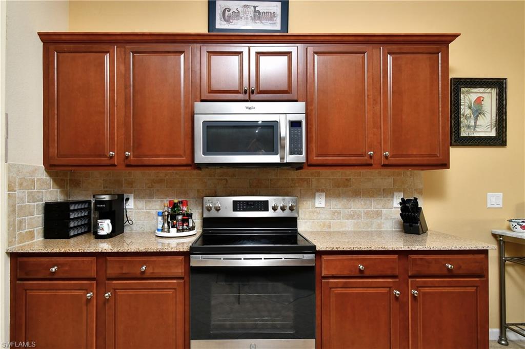Granite counter tops, Electric range with self cleaning oven and microwave