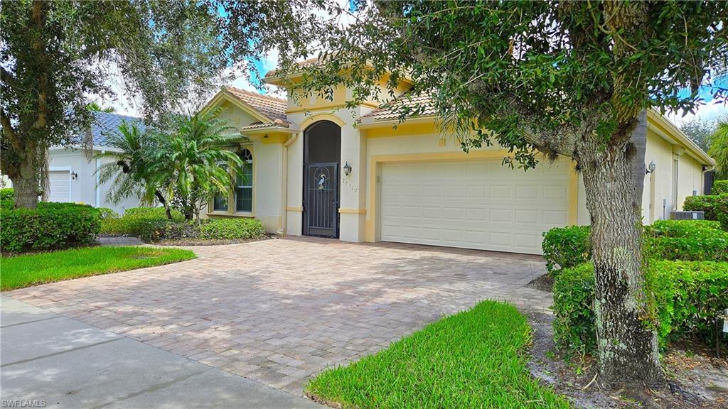 Front view of house, note extra wide driveway