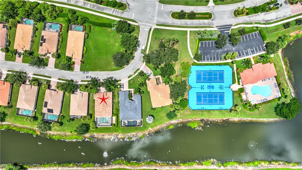 Club house pool and tennis area; note how close this home is to this amenity