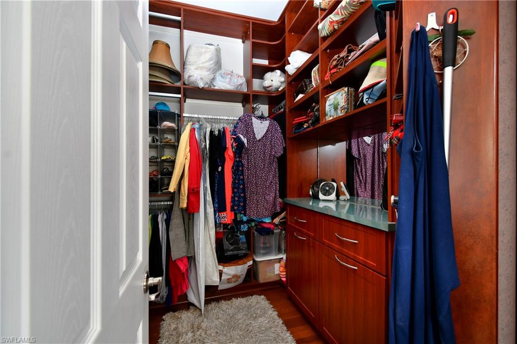 Another view shows shelving that goes all the way up to the ceiling.