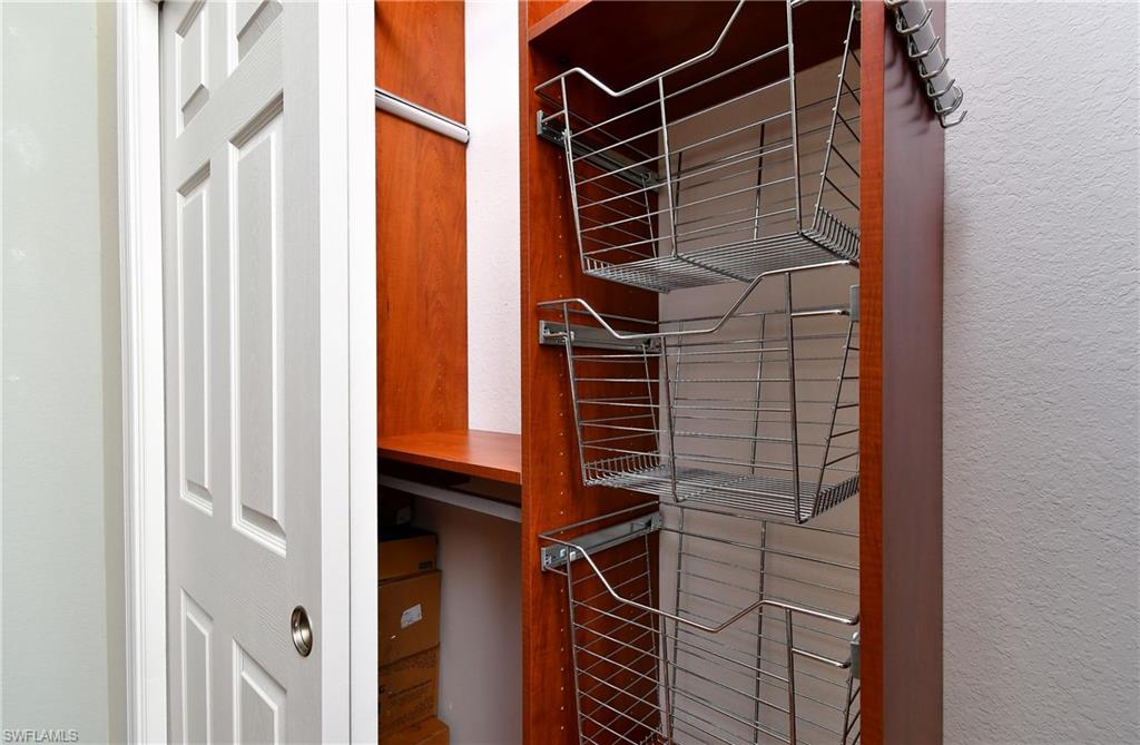 2nd BR with California closet shelves and drawers.
