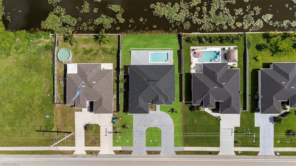 Aerial view of residential area with a pool