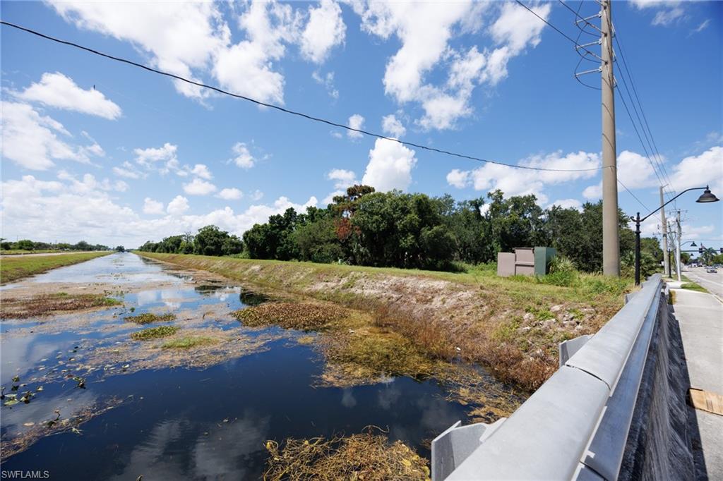 View of Ten Mile Canal next to commercial lot
