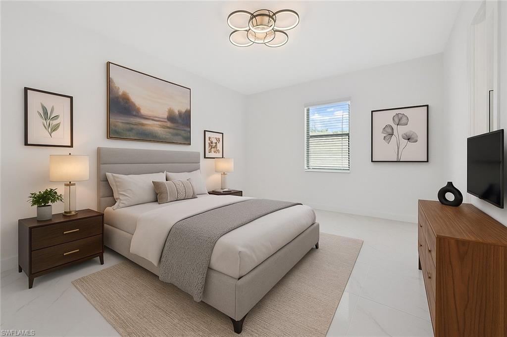 Bedroom featuring baseboards