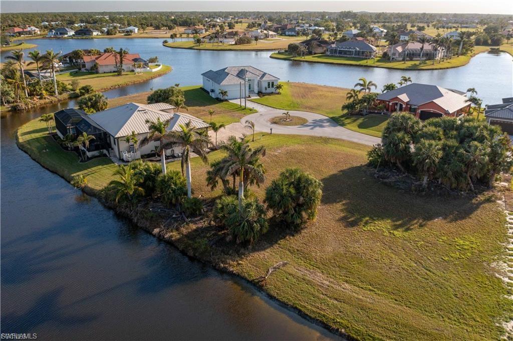 Aerial view of residential area with a nearby body of water