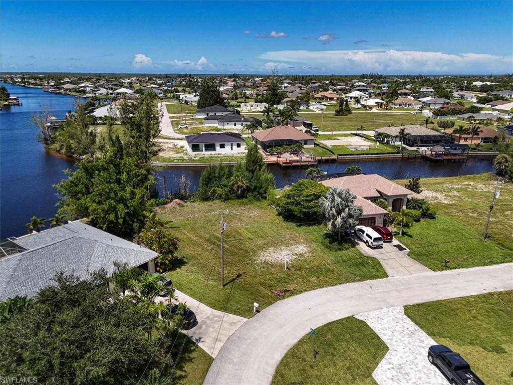 Aerial view of residential area with a nearby body of water