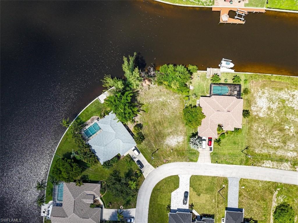 Aerial view of residential area with a nearby body of water