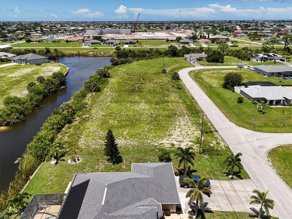 Aerial view of residential area with a nearby body of water