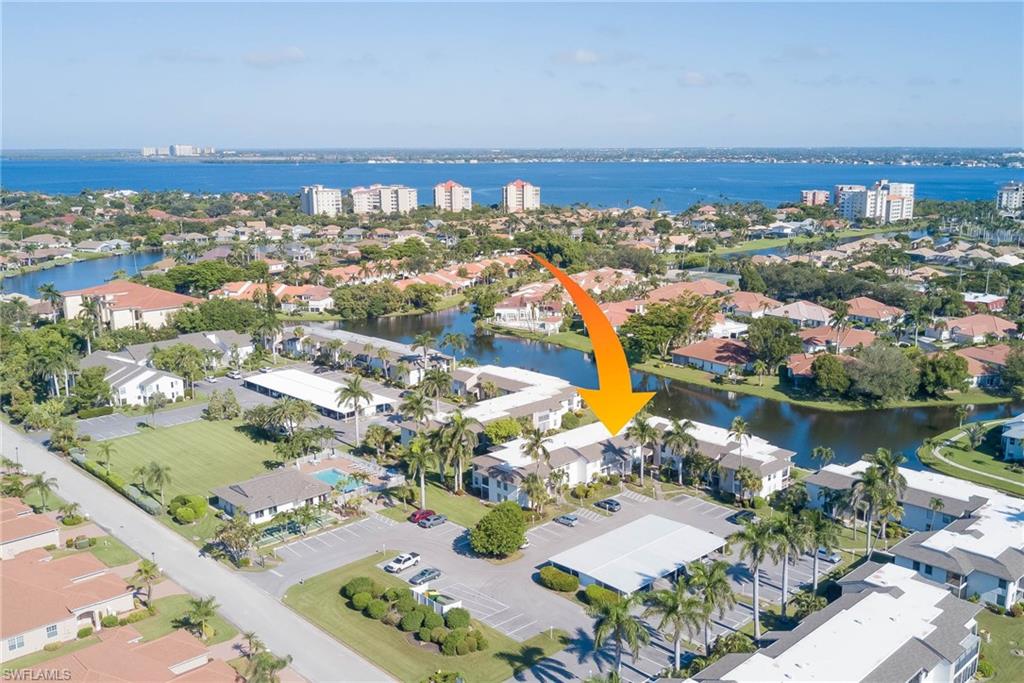 Aerial view of residential area with a large body of water