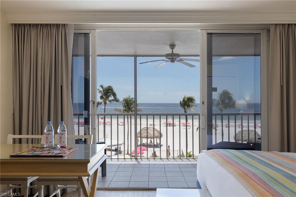 Screened balcony overlooking the pool and straight out to the beach!!