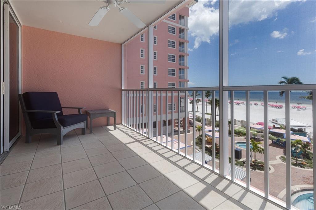 Balcony with view of the pool and beach