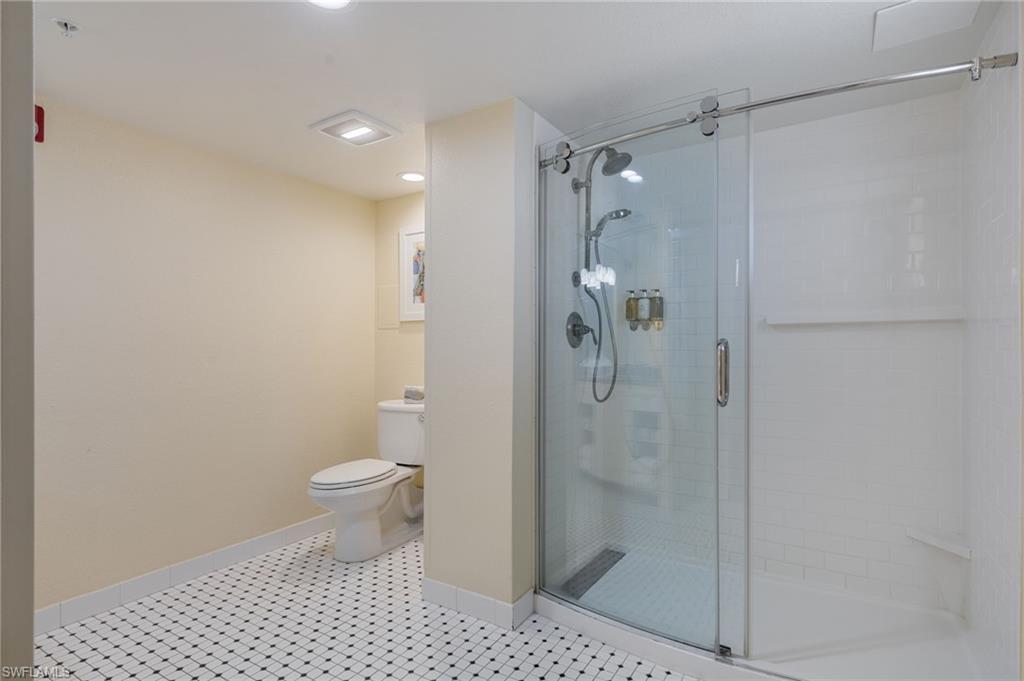 Spa-like bathroom with clear glass shower.